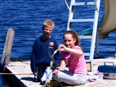 kids_on_swiming_dock.JPG